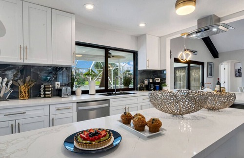 Wellington Villa | Stylish Lake Luxe Equine, on waterfront w screened-in pool - Lake Views! Hosted By Relaxtay