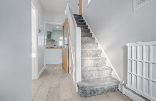 Bedford Apartment | Stylishly decorated 3 bed house presented by Our Home Short Stays comfortable beds with crisp linen and plenty of outdoor space to enjoy