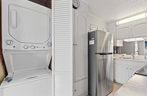 Thomas Drive Condo | Sunkissed Bliss Steps to Sand 2nd Floor Beachfront + Free Chairs+Tikki Bar