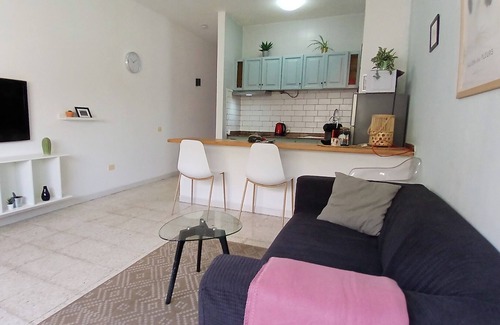 Puerto del Rosario Apartment | Sunlit apt steps from beach! Cozy and modern. Walk everywhere. Perfect getaway!