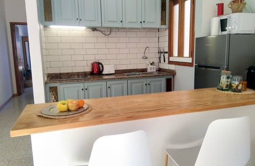 Puerto del Rosario Apartment | Sunlit apt steps from beach! Cozy and modern. Walk everywhere. Perfect getaway!