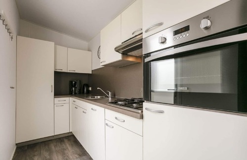 Lochem Ski Chalet | Sunlit Chalet by the Pond