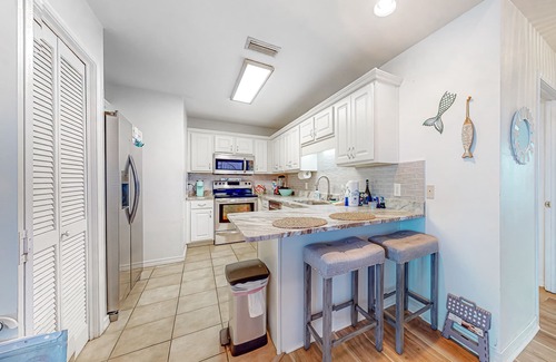 Gulf Shores Condo | Sunlit, two-story condo with pool, walk one block to the beach