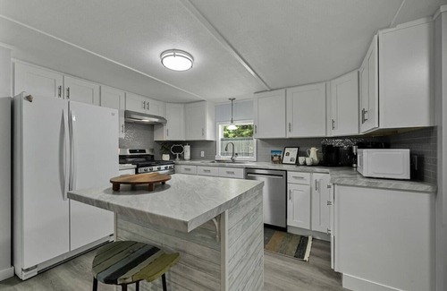 Interlochen House | Sunny 3BR w/Firepit + Game Yard | Walk to Green Lake