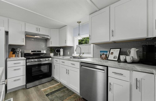 Interlochen House | Sunny 3BR w/Firepit + Game Yard | Walk to Green Lake