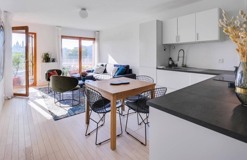 Porte de la Chapelle Apartment | Sunny apt with view of Paris and the Sacré-Cœur