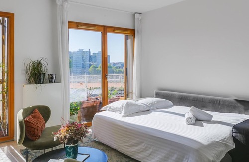 Porte de la Chapelle Apartment | Sunny apt with view of Paris and the Sacré-Cœur