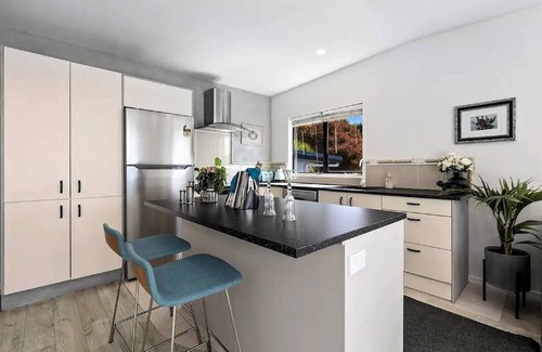 Torbay House | Sunny Coastal Escape with Deck, Privacy & Walk to Long Bay Beach