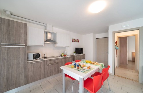 Lignano Sabbiadoro Apartment | Sunny getaway with a beautiful terrace in Lignano