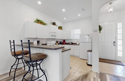 Tuscan Hills House | Sunny home with pool, lanai, foosball, fast WiFi & washer/dryer