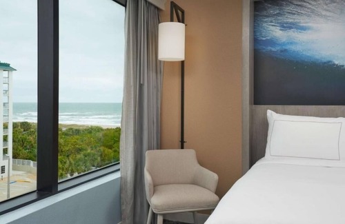 Cocoa Beach Hotel | Sunny Retreat! 2 Modern Units! Onsite Pool, Parking, Private Beach Access!