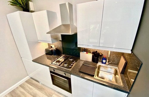 Newton Ferrers Cabin | Sunridge Cube 2 with Hot Tub & Giant Home Cinema