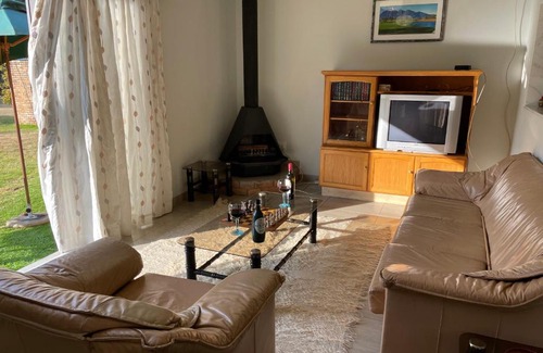 De Deur House | Sunrise Cottage Golfview Lodge