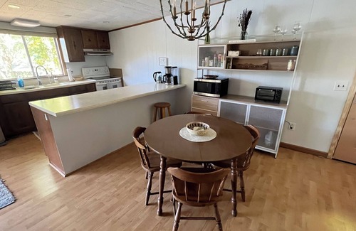 Robbinsville Cabin | Sunset Cove, a charming waterfront cabin with boat dock on Lake Santeetlah