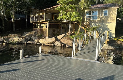 Robbinsville Cabin | Sunset Cove, a charming waterfront cabin with boat dock on Lake Santeetlah