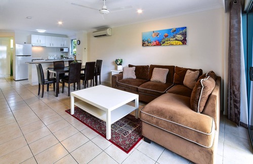 Hamilton Island Apartment | Sunset Waters 01 - Marina Side 2 Bedroom with buggy.