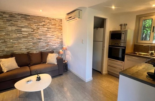 Santa Giulia Apartment | Superb ground garden villa, close to beaches, santa giulia, WiFi, air conditioning