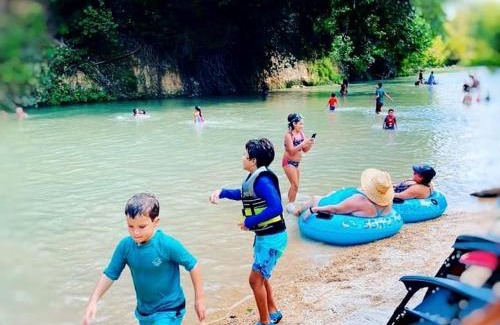 Fentress Other | Texas Creekside Safari Tent Glamping Perfect for Nature Retreats for Water Sports Enthusiasts