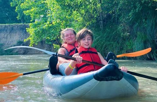 Fentress Other | Texas Creekside Safari Tent Glamping Perfect for Nature Retreats for Water Sports Enthusiasts