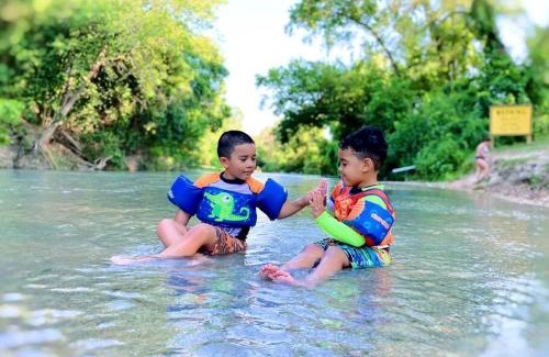 Fentress Other | Texas Creekside Safari Tent Glamping Perfect for Nature Retreats for Water Sports Enthusiasts