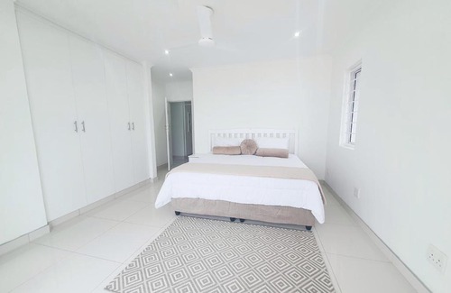 Tinley Manor Villa | The Adam Legacy Beach House