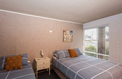 Portarlington Apartment | The Beachy Unit - Bright and fresh interior, with pool and close proximity to town.