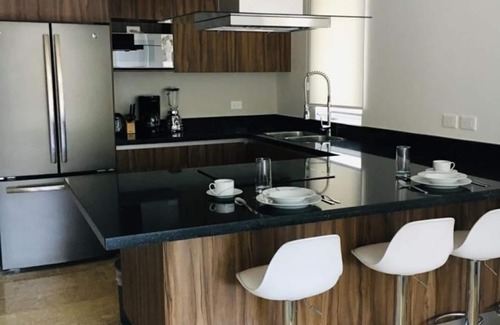 Chetumal Apartment | The best of both worlds: a cozy modern apartment near the beach and golf course