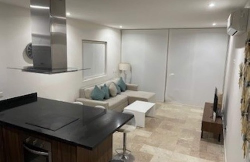 Chetumal Apartment | The best of both worlds: a cozy modern apartment near the beach and golf course