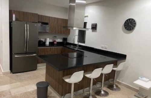 Chetumal Apartment | The best of both worlds: a cozy modern apartment near the beach and golf course