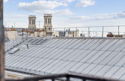 Quartier de Rochechouart Apartment | The Bibliophile’s Haven, by Veeve