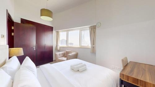 Dubai Sports City Apartment | The Bridge - Tranquil Two Bedroom in Sports City
