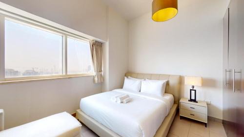 Dubai Sports City Apartment | The Bridge - Tranquil Two Bedroom in Sports City
