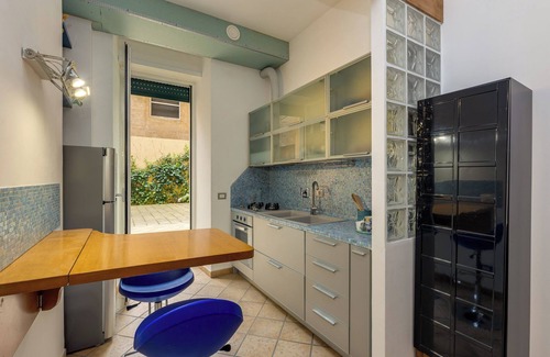 Tuscolano Apartment | The captain's cabin In style in this downtown space.