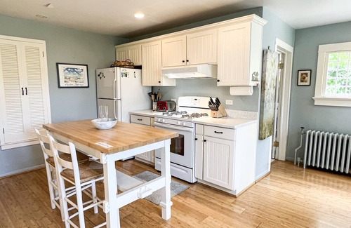 Wequetonsing Cottage | The Castle Cottage - 63 Beach - Weque - Private Lake Access