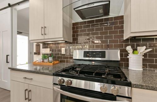 Old Town North House | The Cycle Haus Rooftop Deck with Hot Tub and Views