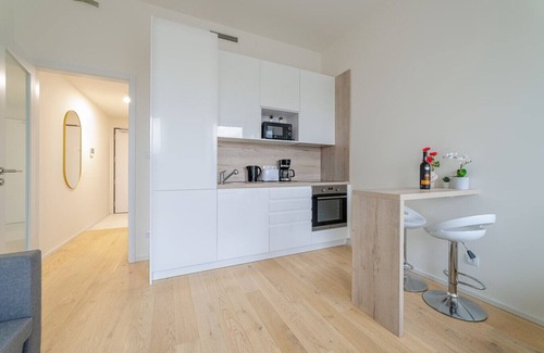 Smichov Apartment | The Elegant White Suite in SmichovCity Residence
