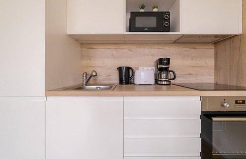 Smichov Apartment | The Elegant White Suite in SmichovCity Residence