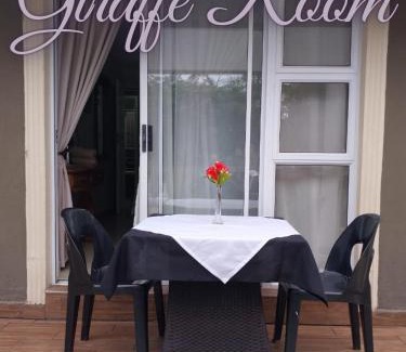 Waterkloof Glen House | The Giraffe Room at Frederick's Place