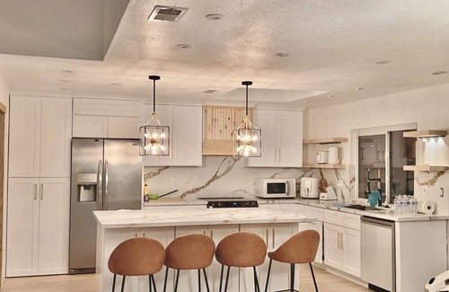 Huntington Beach House | The house is at the intersection the food service center -beach-bank