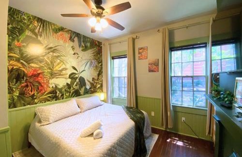 Savannah Victorian District Apartment | The Jungle Nook - Themed Getaway,Backyard,Grill