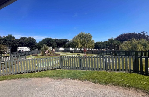Newquay House | The Lucky Shamrock Caravan | Coastal Retreat | Family-friendly with playgrounds
