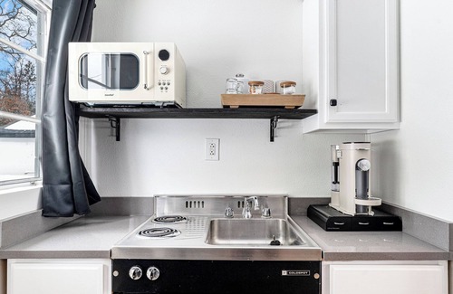 Grayling Hotel | The Mushroom King Bed w/Sauna, Fire Pit, & Hot Tub