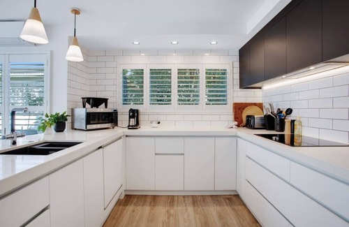 Takapuna House | The Oasis Home with Hot Tub and Parking