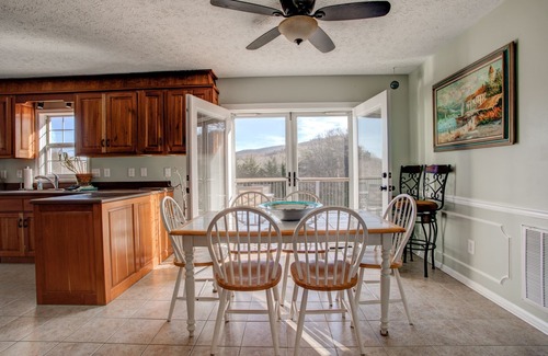 Oakley House | The Pink House on Floyd - 3 bedroom with hot tub, large deck, and fenced yard.