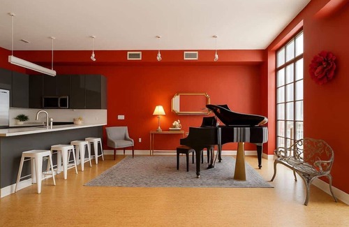 Downtown Dallas Apartment | The Red Room. Double King Bed. Grand Piano