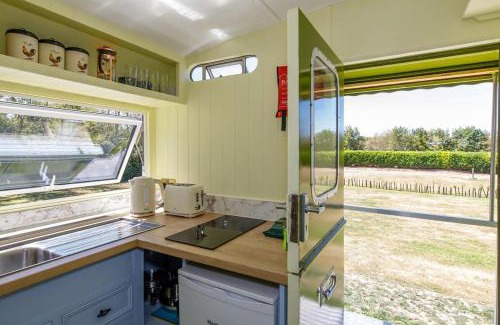 Birdham House | The Showman's Carriage w King Bed close to beach