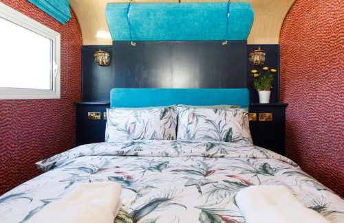 Birdham House | The Showman's Carriage w King Bed close to beach
