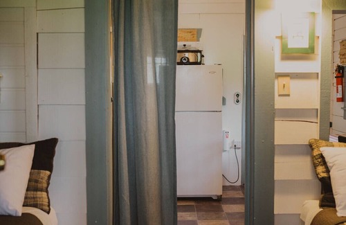 Seeley Lake Cabin | Thimbleberry is at Tamaracks Resort, with a screened-in porch facing the lake.