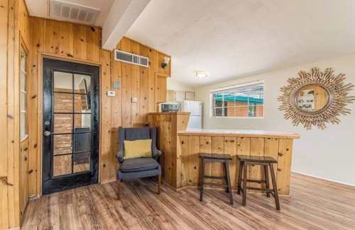 The Garden District Apartment | This centrally located 1 bedroom features a full size pool and electric vehicle charging on site.