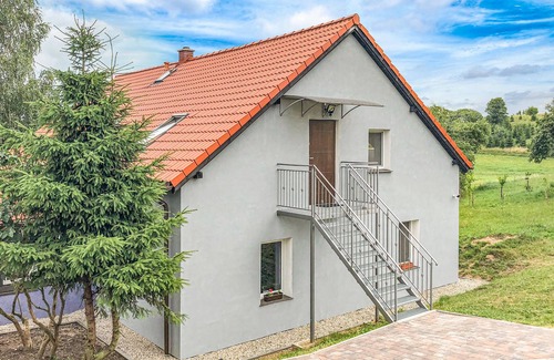 Biskupiec Apartment | This cozy vacation apartment is located in the Polish village of Najdymowo.